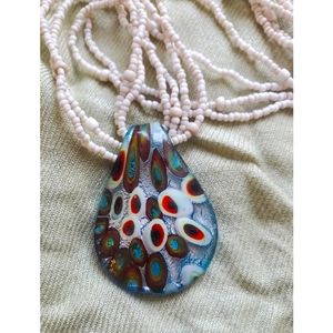 Blown glass pendant with adjustable beaded necklace